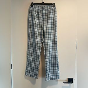 Never worn blue checkered trousers.